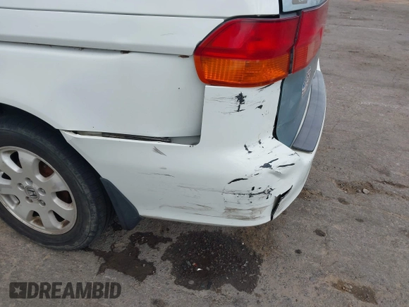 2001 Honda Odyssey EX z VIN 2HKRL18661H566973, wystawiony jako IAAI lot #42117015 z przebiegiem 206 999 mil mil oraz . Historia ofert i sprzedaży dostępna na DreamBid. Obrazek 6.