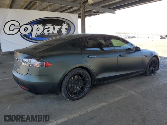 2018 Tesla Model S 75D with VIN 5YJSA1E21JF282786, listed as a Copart auction lot 58058595 with 65,982 mi miles and Salvage title. Bid and sale history available at DreamBid. Image 3.