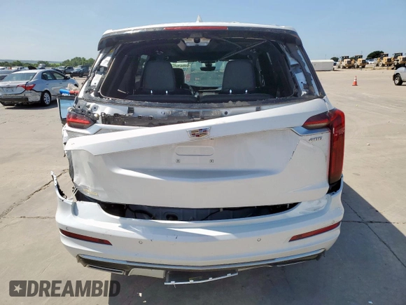 2024 Cadillac XT6 FWD Premium Luxury with VIN 1GYKPCRS7RZ711983, listed as a Copart auction lot 64842625 with 6,394 mi miles and Clean title. Bid and sale history available at DreamBid. Image 6.