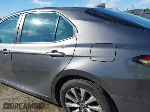 2019 Toyota Camry LE with VIN 4T1B11HK4KU254853, listed as a IAAI auction lot 42013255 with 153,664 mi miles and . Bid and sale history available at DreamBid. Image 21.