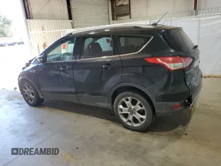 2016 Ford Escape Titanium with VIN 1FMCU0J91GUB09161, listed as a Copart auction lot 50027315 with 106,784 mi miles and Salvage Title. Bid and sale history available at carsss.com. Image 2.