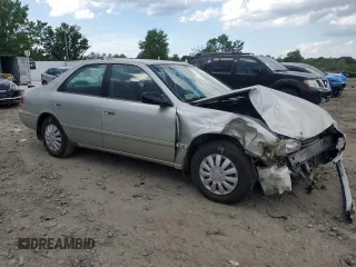 2000 Toyota Camry CE z VIN 4T1BG22K9YU653036, wystawiony jako Copart lot #55363475 z przebiegiem 84 258 mil mil oraz Szkoda całkowita • Salvage title. Historia ofert i sprzedaży dostępna na DreamBid. Obrazek 4.