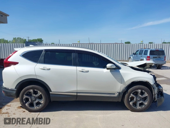 2018 Honda CR-V Touring with VIN 2HKRW2H92JH662753, listed as a IAAI auction lot 39538586 with 83,202 mi miles. Bid and sale history available at carsss.com. Image 14.