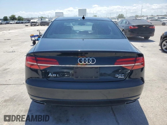 2018 Audi A8 z VIN WAU44AFD0JN000880, wystawiony jako Copart lot #54751235 z przebiegiem 76 161 mil mil oraz Szkody całkowita. Historia ofert i sprzedaży dostępna na DreamBid. Obrazek 6.