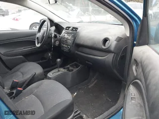 2015 Mitsubishi Mirage DE with VIN ML32A3HJ4FH045086, listed as a IAAI auction lot 42068823 with 83,250 mi miles. Bid and sale history available at carsss.com. Image 5.