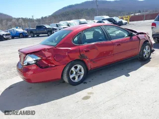 2001 Ford Taurus SES with VIN 1FAFP55U81A270724, listed as a IAAI auction lot 41898500 with 142,587 mi miles. Bid and sale history available at carsss.com. Image 4.