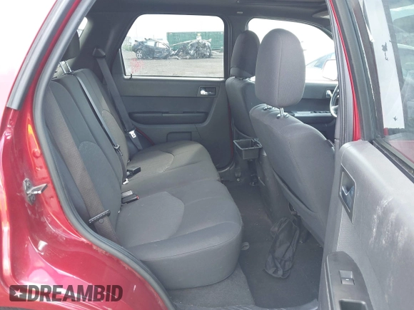 2008 Mercury Mariner Premier with VIN 4M2CU97178KJ00739, listed as a IAAI auction lot 42312408 with 167,591 mi miles and . Bid and sale history available at DreamBid. Image 8.