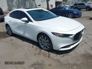 2023 Mazda 3 S Carbon Edition z VIN 3MZBPACM1PM356552, wystawiony jako IAAI lot #42603574 z przebiegiem 20 092 mil mil oraz . Historia ofert i sprzedaży dostępna na DreamBid. Obrazek 1.