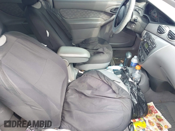 2003 Ford Focus ZX3 with VIN 3FAFP31313R104703, listed as a IAAI auction lot 42487996 with 91,526 mi miles and . Bid and sale history available at DreamBid. Image 5.
