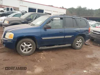 2002 GMC Envoy SLT with VIN 1GKDT13S322515582, listed as a IAAI auction lot 41528624 with 258,904 mi miles. Bid and sale history available at carsss.com. Image 6.
