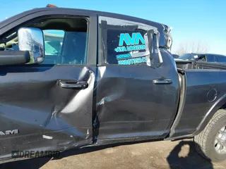 2021 Ram 2500 Laramie z VIN 3C6UR5FL7MG629012, wystawiony jako IAAI lot #41369353 z przebiegiem 168 099 mil mil oraz . Historia ofert i sprzedaży dostępna na DreamBid. Obrazek 18.