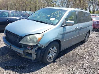 2006 Honda Odyssey EX-L z VIN 5FNRL38786B105476, wystawiony jako IAAI lot #42141512 z przebiegiem Nie podano mil oraz . Historia ofert i sprzedaży dostępna na DreamBid. Obrazek 2.