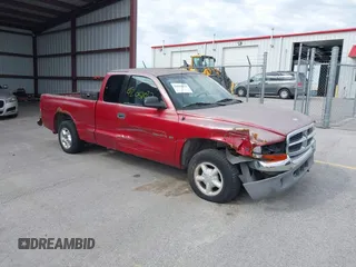1998 Dodge Dakota SLT z VIN 1B7GL22X1WS753125, wystawiony jako IAAI lot #42021033 z przebiegiem 182 829 mil mil oraz . Historia ofert i sprzedaży dostępna na DreamBid. Obrazek 1.