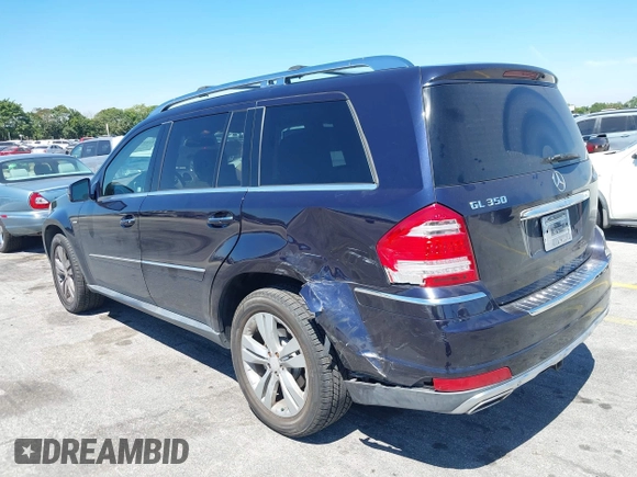 2012 Mercedes-Benz GL 350 with VIN 4JGBF2FEXCA776247, listed as a IAAI auction lot 41837519 with 119,421 mi miles and . Bid and sale history available at DreamBid. Image 6.