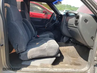 1999 Chevrolet S-10 LS with VIN 1GCCS19X3X8133053, listed as a Copart auction lot 63750774 with 136,081 mi miles and Salvage Title. Bid and sale history available at carsss.com. Image 7.