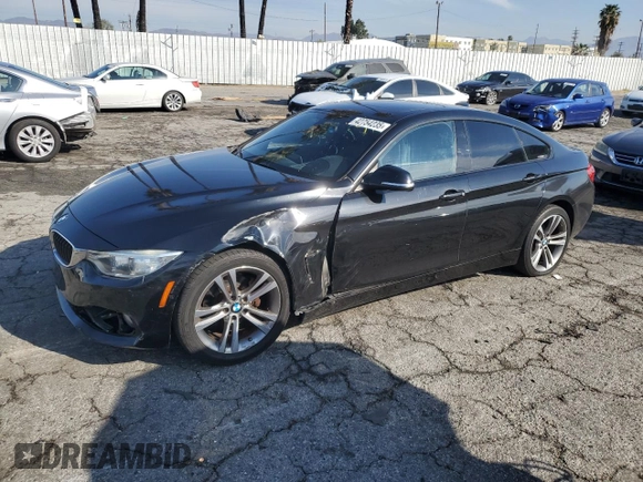 2015 BMW 4 Series 428i with VIN WBA4A5C57FD410621, listed as a Copart auction lot 42754235 with 122,822 mi miles and Salvage Title. Bid and sale history available at carsss.com. Image 1.