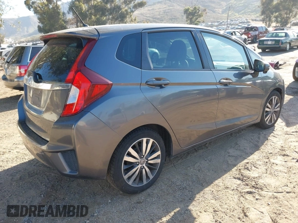 2015 Honda Fit EX-L with VIN 3HGGK5H88FM772964, listed as a IAAI auction lot 42020142 with 154,799 mi miles. Bid and sale history available at carsss.com. Image 4.