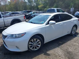 2013 Lexus ES 300h Hybrid with VIN JTHBW1GG1D2038698, listed as a IAAI auction lot 42173883 with 253,281 mi miles. Bid and sale history available at carsss.com. Image 2.
