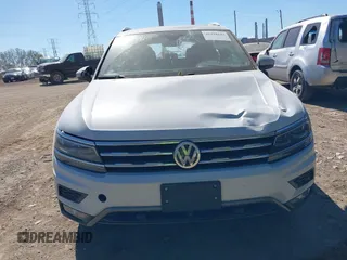 2018 Volkswagen Tiguan SEL Premium with VIN 3VV5B7AX5JM004713, listed as a IAAI auction lot 40498843 with 92,256 mi miles and . Bid and sale history available at DreamBid. Image 12.