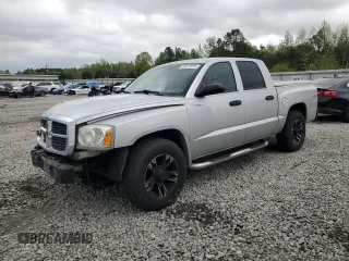 2006 Dodge Dakota SLT z VIN 1D7HW48N96S517826, wystawiony jako Copart lot #51311515 z przebiegiem 202 192 mil mil oraz Szkoda całkowita • Salvage title. Historia ofert i sprzedaży dostępna na DreamBid. Obrazek 1.