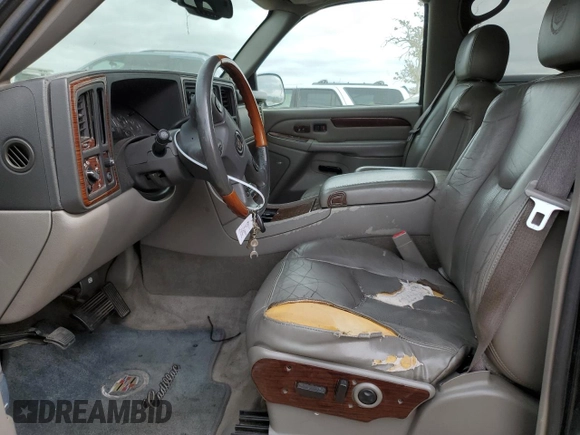 2004 Cadillac Escalade z VIN 1GYEC63T64R260162, wystawiony jako Copart lot #54725685 z przebiegiem 223 615 mil mil oraz Szkoda całkowita • Salvage title. Historia ofert i sprzedaży dostępna na DreamBid. Obrazek 7.