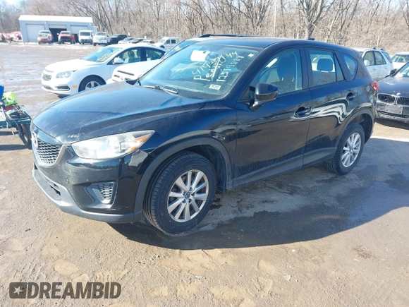 2014 Mazda CX-5 Sport with VIN JM3KE2BE7E0313978, listed as a IAAI auction lot 41437144 with 161,181 mi miles and . Bid and sale history available at carsss.com. Image 17.