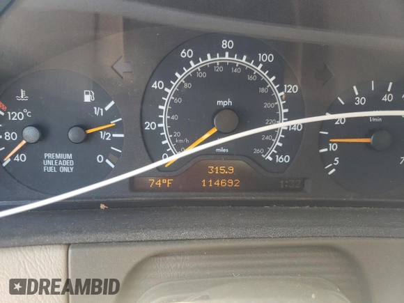 1997 Mercedes-Benz E-Class with VIN WDBJF72F0VA189407, listed as a Copart auction lot 76073234 with 114,692 mi miles and Salvage Title. Bid and sale history available at carsss.com. Image 9.