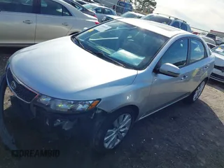 2012 Kia Forte SX with VIN KNAFW4A37C5621409, listed as a IAAI auction lot 41608698 with 202,731 mi miles. Bid and sale history available at carsss.com. Image 2.