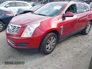 2015 Cadillac SRX z VIN 3GYFNAE3XFS572970, wystawiony jako IAAI lot #40854902 z przebiegiem 124 779 mil mil oraz . Historia ofert i sprzedaży dostępna na DreamBid. Obrazek 2.