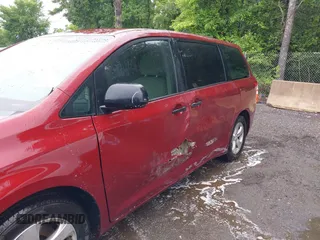 2014 Toyota Sienna L with VIN 5TDZK3DC0ES457242, listed as a IAAI auction lot 42307360 with 86,857 mi miles and . Bid and sale history available at DreamBid. Image 6.