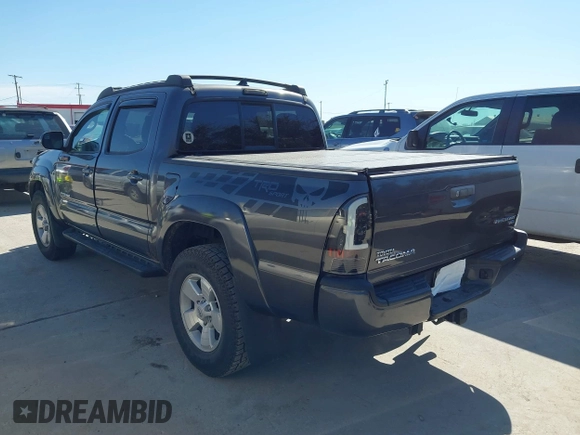 2014 Toyota Tacoma PreRunner with VIN 5TFJU4GN3EX057731, listed as a IAAI auction lot 41703750 with 110,321 mi miles. Bid and sale history available at carsss.com. Image 3.