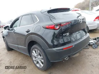 2023 Mazda CX-30 2.5 S Premium Package with VIN 3MVDMBDM3PM559627, listed as a IAAI auction lot 40910485 with 8,365 mi miles. Bid and sale history available at carsss.com. Image 3.