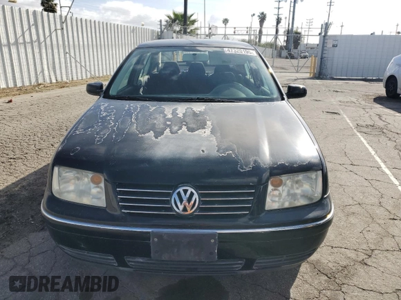 2004 Volkswagen Jetta GL z VIN 3VWRK69M54M092295, wystawiony jako Copart lot #47320195 z przebiegiem 161 593 mil mil oraz Szkoda całkowita • Salvage title. Historia ofert i sprzedaży dostępna na DreamBid. Obrazek 5.