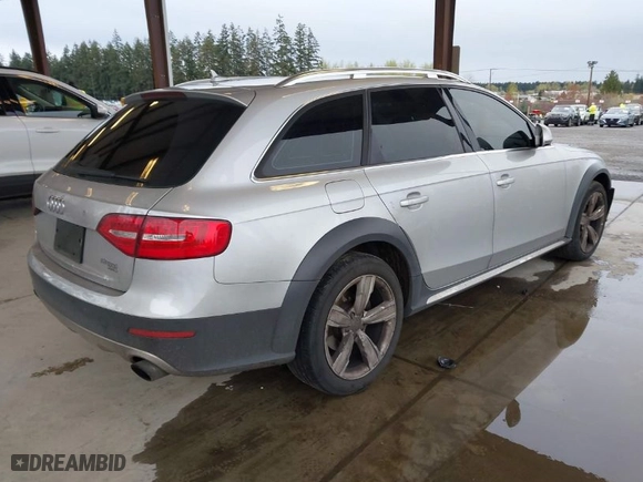 2013 Audi allroad Premium Plus with VIN WA1UFAFL0DA184311, listed as a IAAI auction lot 41976884 with 114,656 mi miles. Bid and sale history available at carsss.com. Image 4.