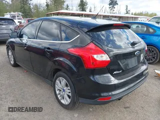 2012 Ford Focus SEL with VIN 1FAHP3M2XCL106248, listed as a IAAI auction lot 42088933 with 117,333 mi miles. Bid and sale history available at carsss.com. Image 3.