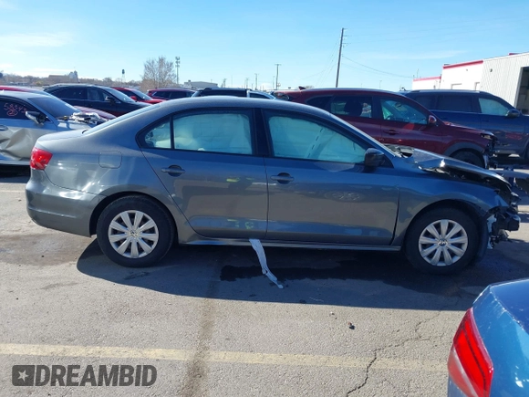 2014 Volkswagen Jetta S z VIN 3VW2K7AJ7EM275448, wystawiony jako IAAI lot #41835358 z przebiegiem 149 272 mil mil oraz . Historia ofert i sprzedaży dostępna na DreamBid. Obrazek 13.