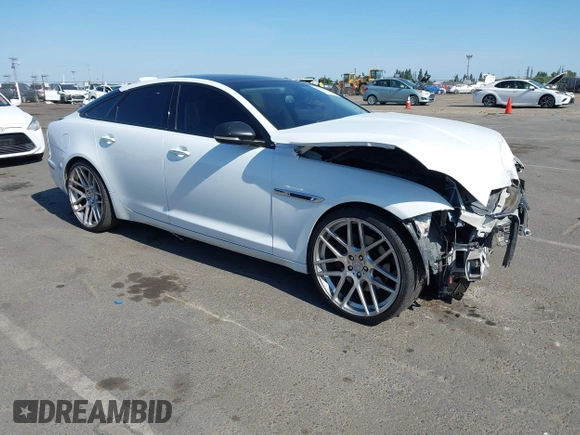 2012 Jaguar XJ with VIN SAJWA1CB6CLV34389, listed as a IAAI auction lot 42473712 with 132,515 mi miles and . Bid and sale history available at DreamBid. Image 1.
