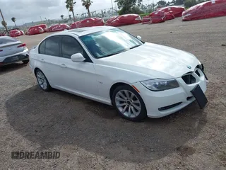 2011 BMW 3 Series 328i with VIN WBAPH5G53BNM80849, listed as a IAAI auction lot 41942772 with 84,876 mi miles. Bid and sale history available at carsss.com. Image 1.