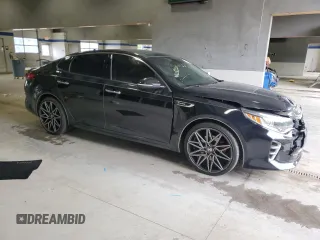 2016 Kia Optima SX Turbo with VIN 5XXGW4L23GG011780, listed as a Copart auction lot 56628295 with 104,288 mi miles and Salvage title. Bid and sale history available at DreamBid. Image 4.