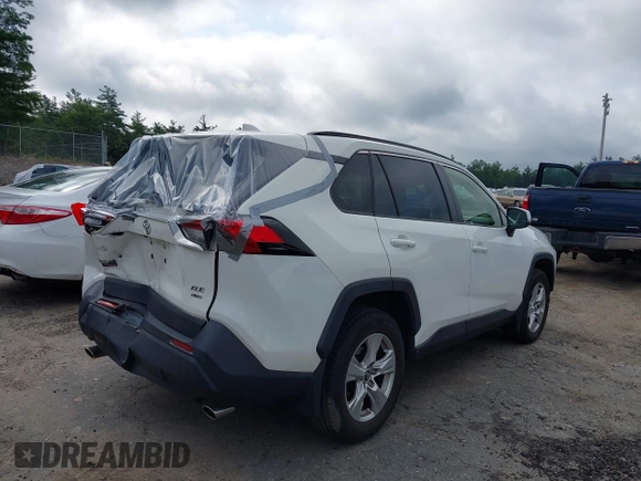 2019 Toyota RAV4 XLE with VIN JTMP1RFV6KD515454, listed as a IAAI auction lot 42618019 with 85,868 mi miles and . Bid and sale history available at DreamBid. Image 4.