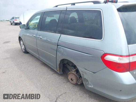 2007 Honda Odyssey EX-L z VIN 5FNRL38717B124209, wystawiony jako IAAI lot #42444334 z przebiegiem 230 123 mil mil oraz . Historia ofert i sprzedaży dostępna na DreamBid. Obrazek 6.