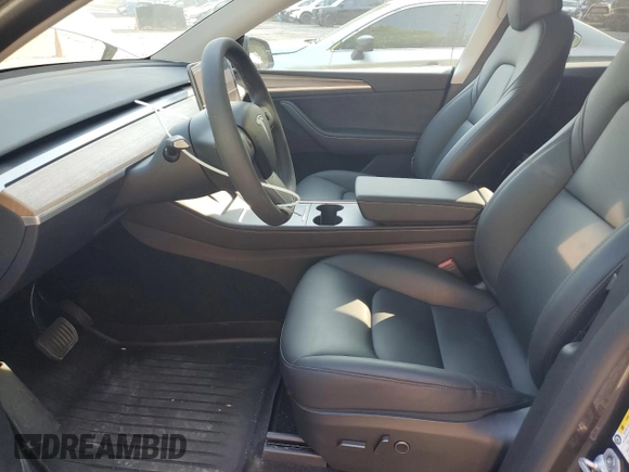 2024 Tesla Model Y Long Range with VIN 7SAYGDEE4RA299503, listed as a Copart auction lot 61950585 with 17,077 mi miles and Salvage title. Bid and sale history available at DreamBid. Image 7.
