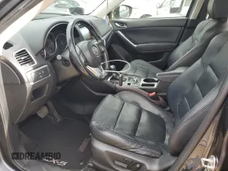 2016 Mazda CX-5 Grand Touring with VIN JM3KE2DY4G0795271, listed as a Copart auction lot 50986845 with 92,323 mi miles and Salvage Title. Bid and sale history available at carsss.com. Image 7.