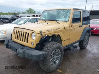2014 Jeep Wrangler Rubicon with VIN 1C4BJWCG4EL145081, listed as a IAAI auction lot 42180723 with 113,659 mi miles and . Bid and sale history available at DreamBid. Image 18.