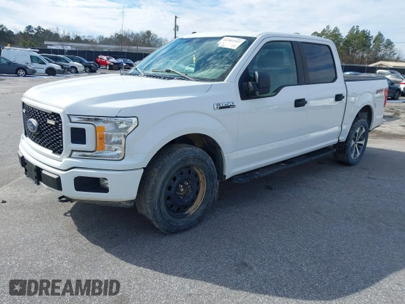 2019 Ford F-150 XL with VIN 1FTEW1E51KFC52807, listed as a IAAI auction lot 41383212 with 124,244 mi miles and . Bid and sale history available at DreamBid. Image 2.
