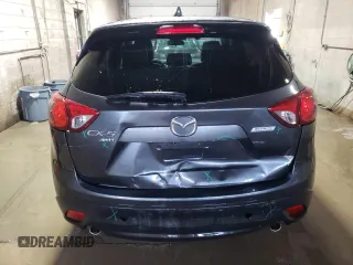 2015 Mazda CX-5 Grand Touring with VIN JM3KE4DY1F0454713, listed as a Copart auction lot 48548285 with 132,454 mi miles and Salvage Title. Bid and sale history available at DreamBid. Image 6.