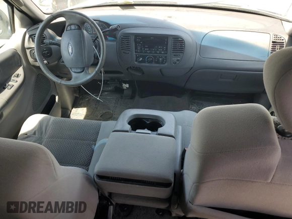 2003 Ford F-150 XL with VIN 2FTRX17L23CA17128, listed as a Copart auction lot 60144965 with 121,055 mi miles and Salvage title. Bid and sale history available at DreamBid. Image 8.