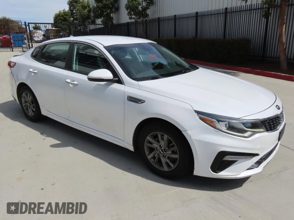 2019 Kia Optima LX with VIN 5XXGT4L36KG329998, listed as a Copart auction lot 52011715 with 123,942 mi miles and Salvage Title. Bid and sale history available at DreamBid. Image 1.