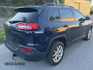 2016 Jeep Cherokee Altitude with VIN 1C4PJLAS7GW208431, listed as a Copart auction lot 61501525 with 126,107 mi miles and Salvage title. Bid and sale history available at DreamBid. Image 4.