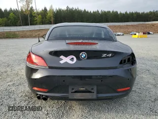 2016 BMW Z4 sDrive28i with VIN WBALL5C50GP557837, listed as a Copart auction lot 51038615 with 59,878 mi miles and Salvage Title. Bid and sale history available at carsss.com. Image 6.